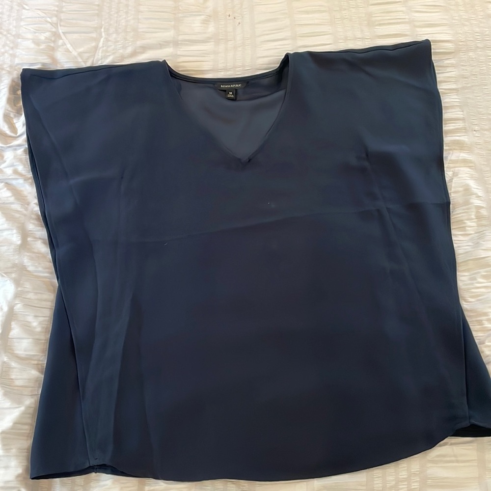 Navy blouse with flutter sleeves